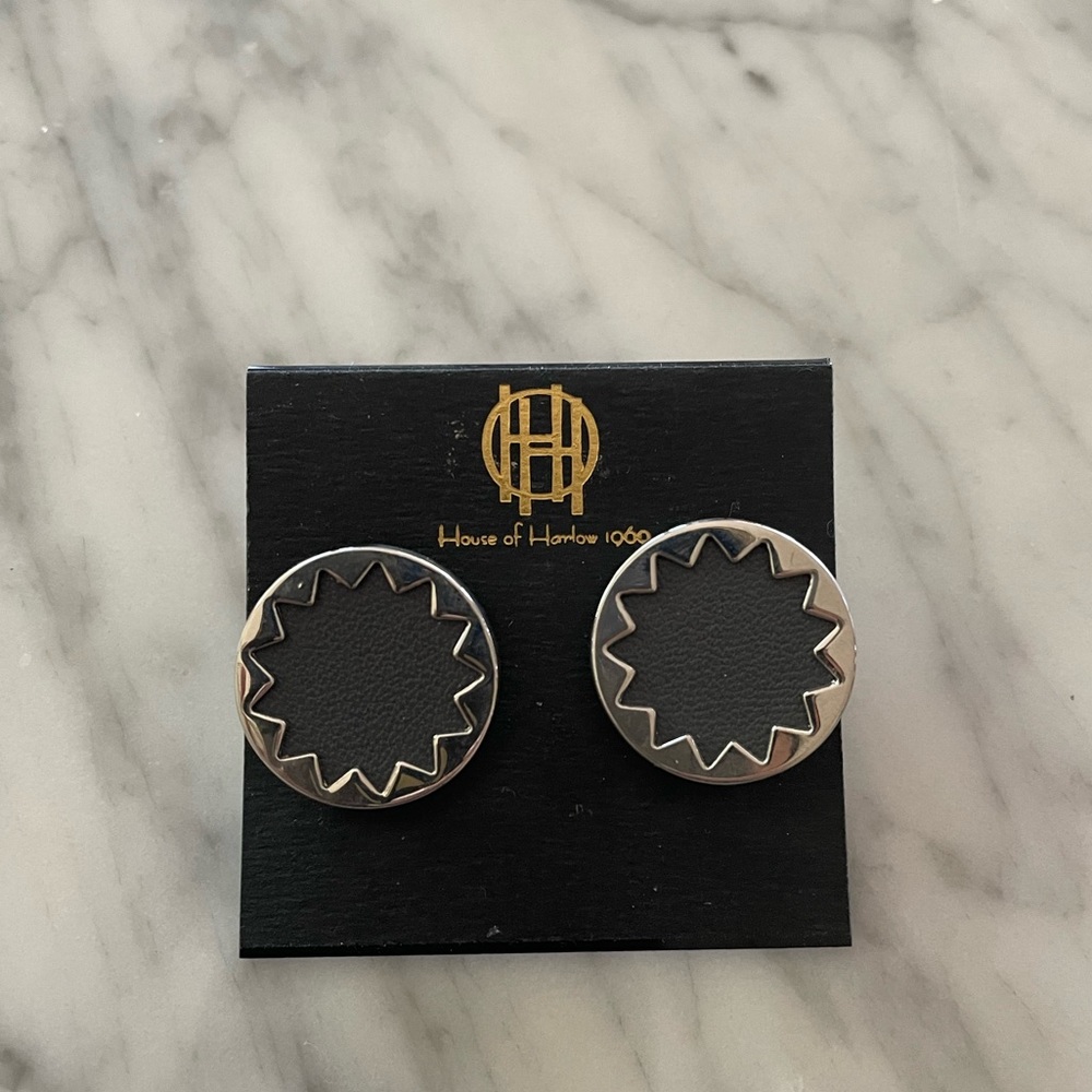 House of Harlow signature starburst leather center/silver outside earrings. New